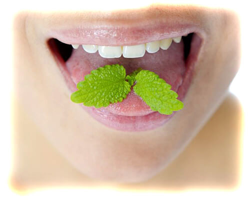 Неприятный запах изо рта: причины и лечение, верхнее фото
